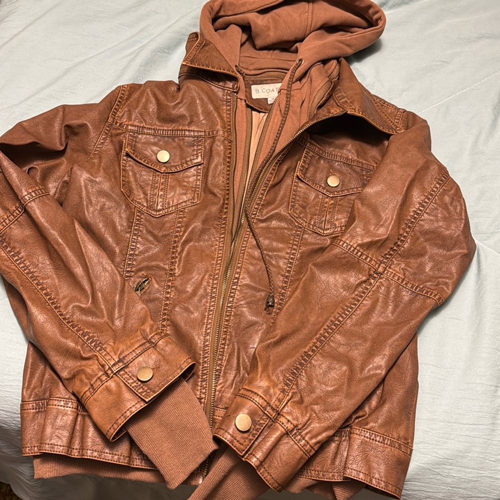 Brand new.. never worn…leather like jacket